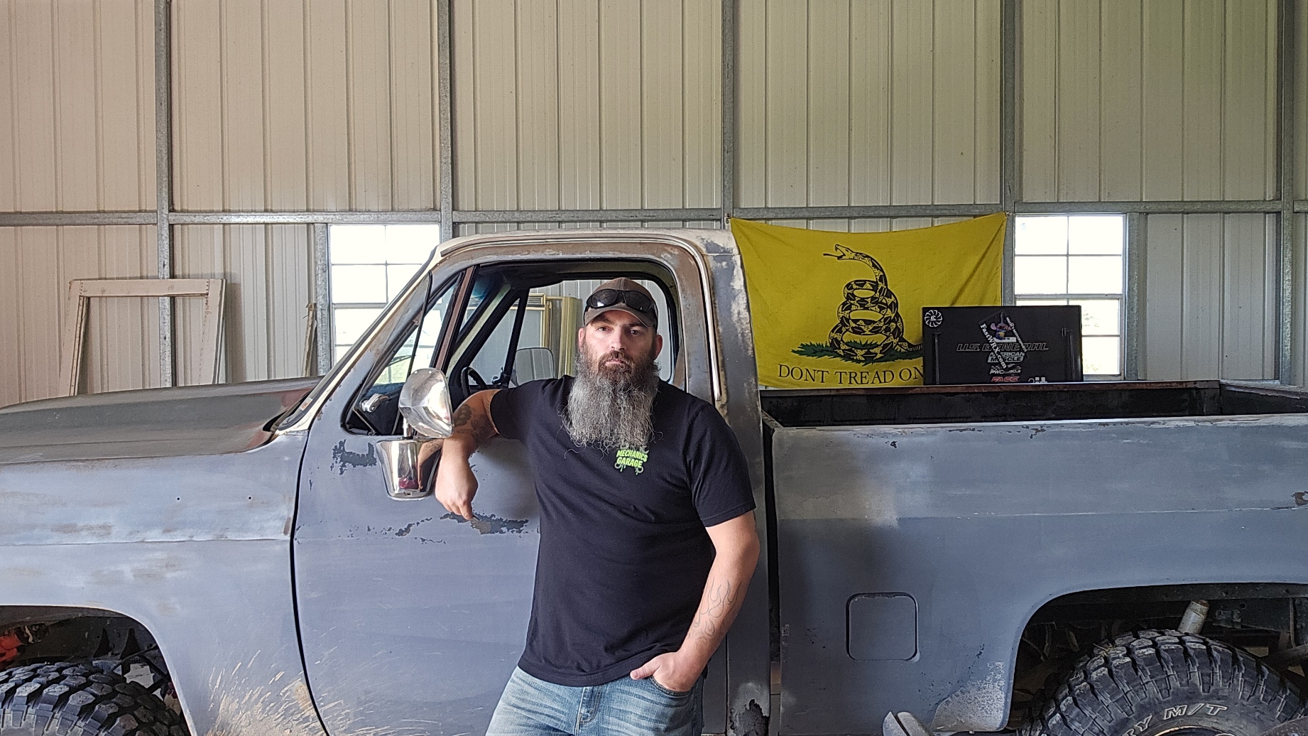 Chris in the garage with his truck